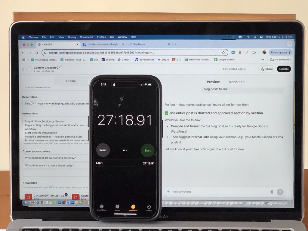 A smartphone displaying a stopwatch at 27 minutes and 18.91 seconds rests against a MacBook Air screen. The laptop shows a completed blog post draft in ChatGPT, created using a custom GPT. The image illustrates the fast writing time achieved after completing the custom GPT course.